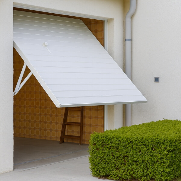 Tilting garage door repair shown mid-tilt, displaying the pivot arms and lifting mechanism during safe operation by Garage Door Repair Guys